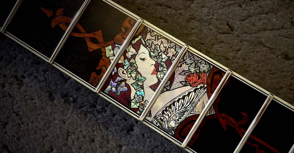 Guitar inlays example - fretboard inlay using abalone and wood inlays.